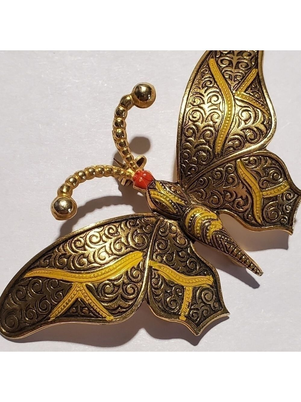 Vintage Goldtone Butterfly Brooch stamped Spain scrolling